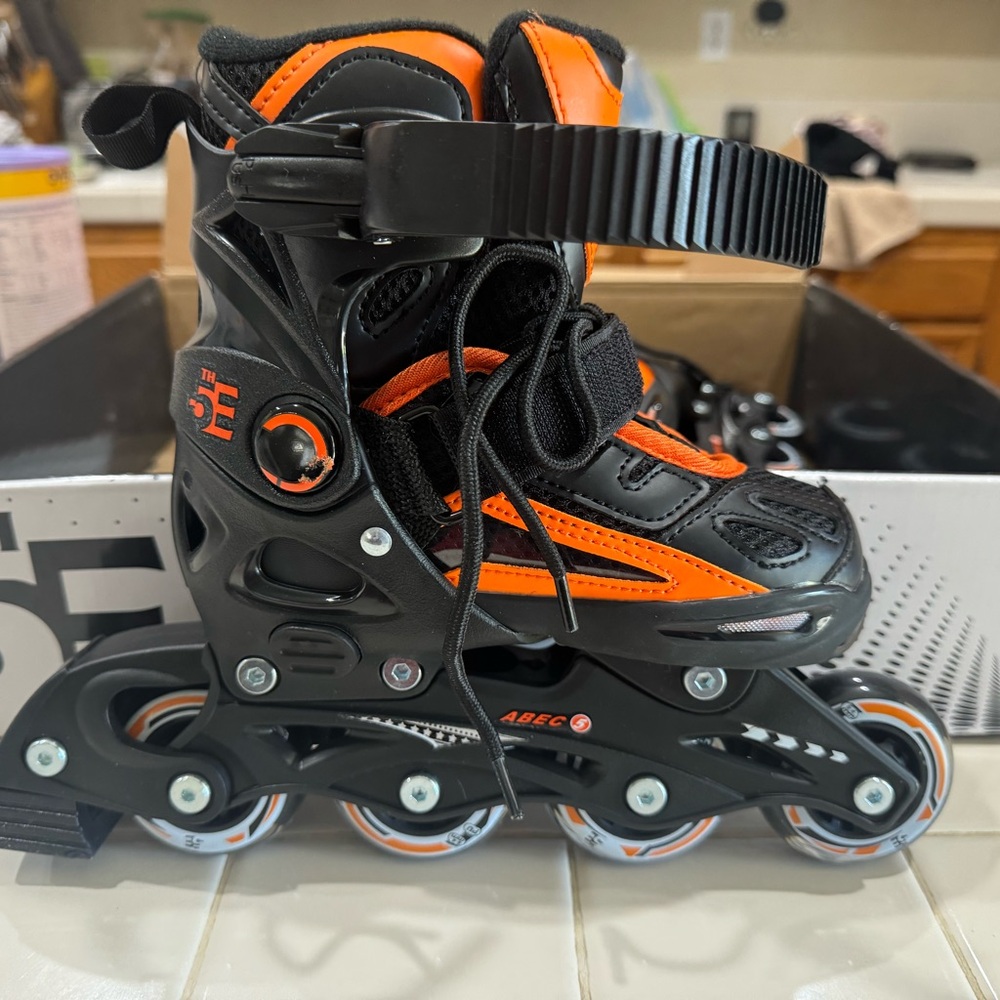Kids Roller Skates - Black and Orange